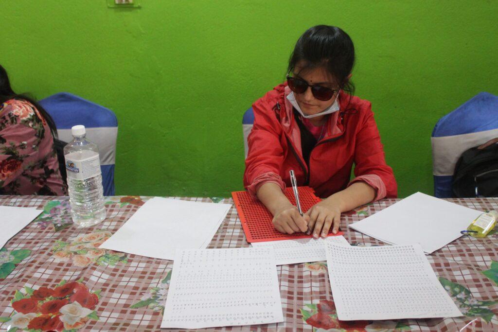Writing sighted letter in slate