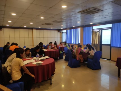 participants divided into groups and doing the activities given to them