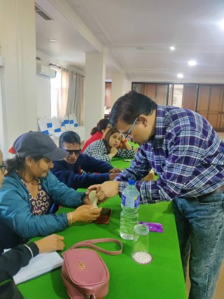 A participant is taught about method of using femidom (contraceptive used by females) by Mr. punay Bhandari
